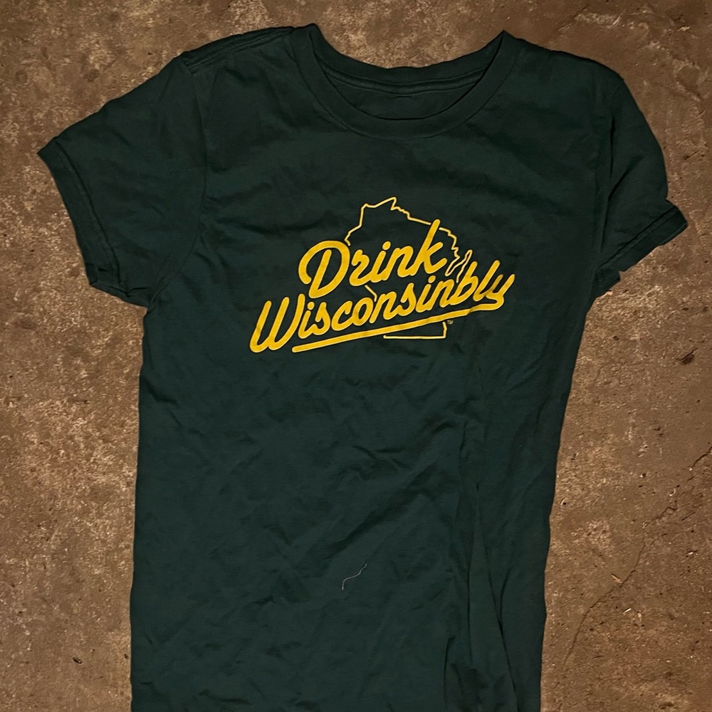 Drink wisconsinbly tshirt green with yellow writing. Size small.